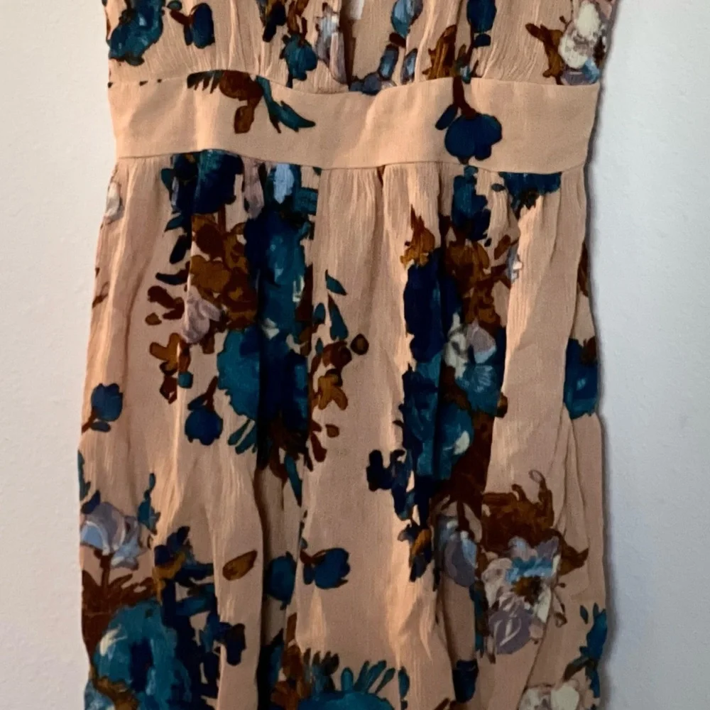 Coveted Clothing Woman’s Floral Romper - Picture 8 of 11